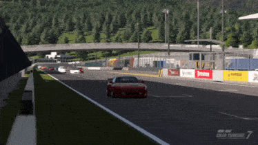 a video game called gran turismo 7 is being played on a track