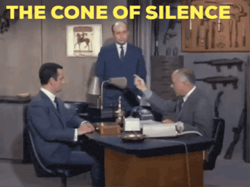 three men are sitting at a desk with the words " the cone of silence " written above them