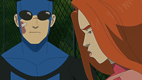 a cartoon character with a bandage on his face is standing next to a woman