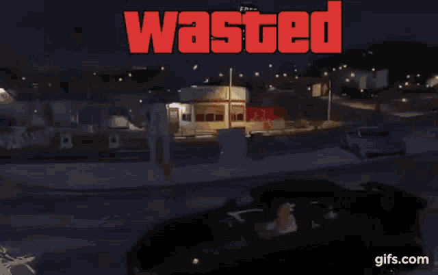 a video game screen shows a car driving down a street and the words wasted above it