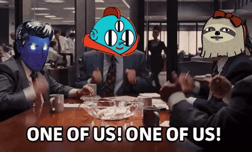 a group of people sitting around a table with one saying one of us one of us