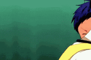 a man with blue hair and a yellow jacket is standing in front of a green wall .