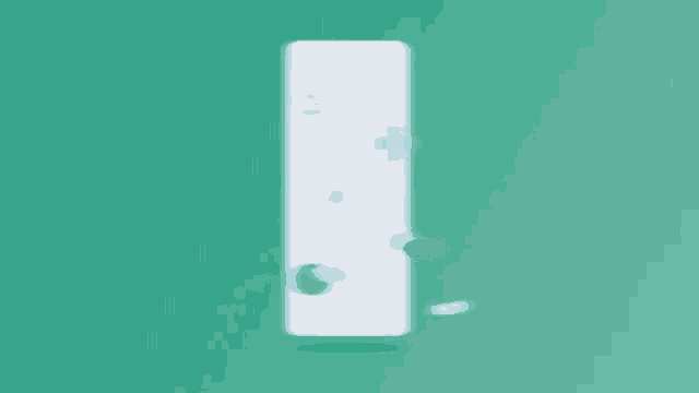 a white wii remote is floating in the air