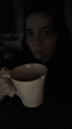 a woman 's face is visible in a blurry photo with the word jovt in the bottom right corner