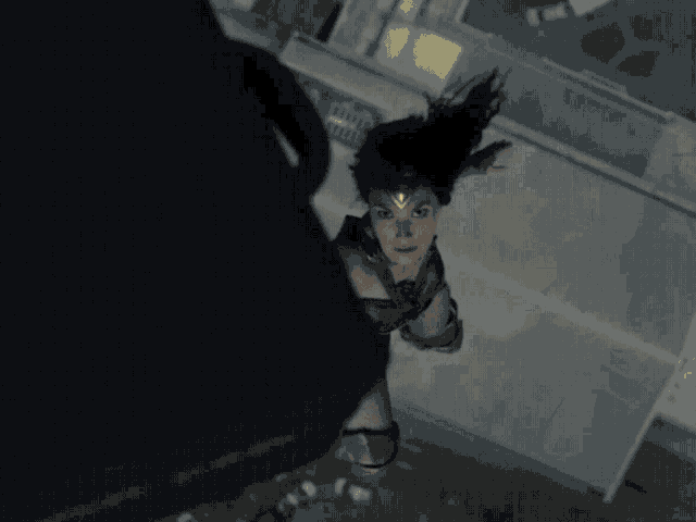 a blurred image of a person standing in the dark
