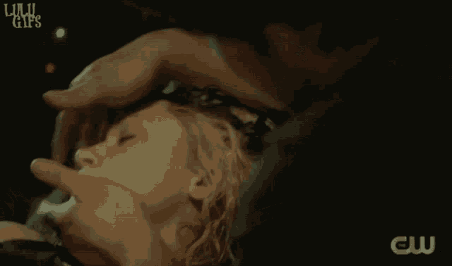 a close up of a person 's face with the words lulu gifs in the corner