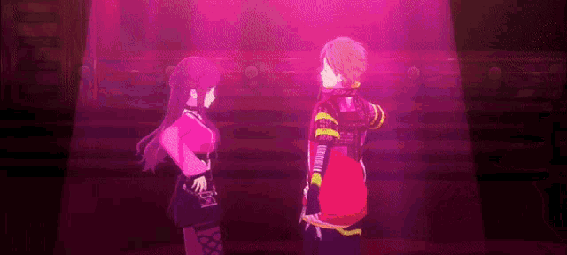 a boy and a girl are standing next to each other on a stage in a video game .