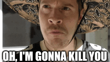 a man wearing a cowboy hat and a saints jersey is saying `` oh , i 'm gonna kill you ''