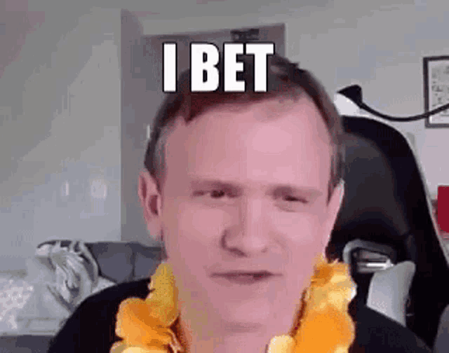 a man wearing a lei and a black shirt is making a funny face .