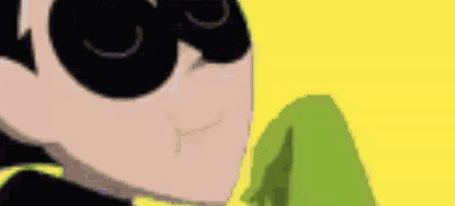 a close up of a cartoon character wearing a mask and sunglasses .