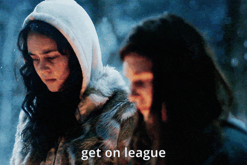 two women standing next to each other with the words get on league written on the bottom