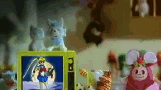 a toy television with a picture of sailor moon on it