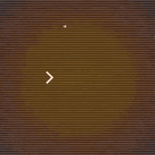 a blurred image of the word goal on a brown background