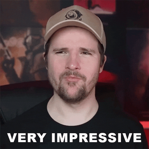 a man wearing a hat says very impressive on the bottom