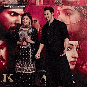 a man and a woman are standing next to each other and holding hands .