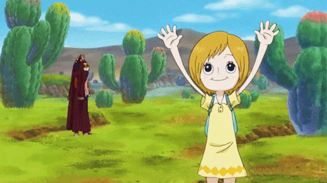 a little girl in a yellow dress with the letter b on her necklace
