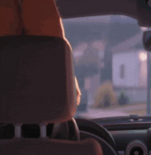 a cartoon character is sitting in the back seat of a car with his mouth open