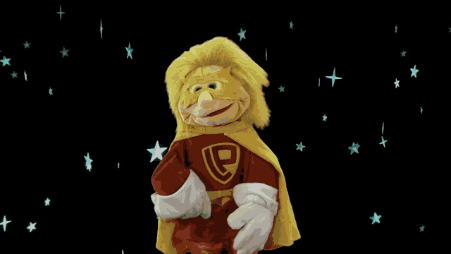 a puppet dressed as a superhero with the letter p on his shirt