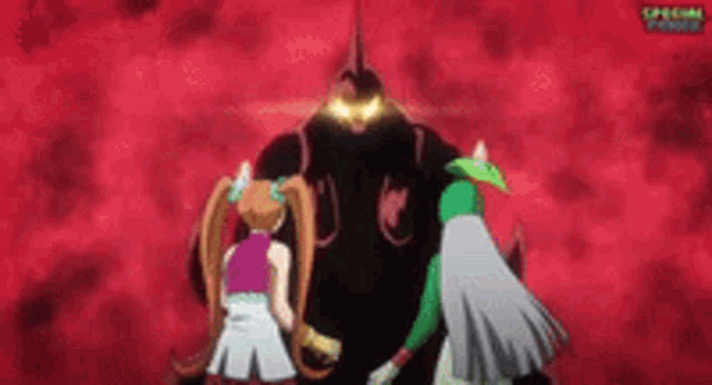 a group of anime characters are standing in front of a large monster .