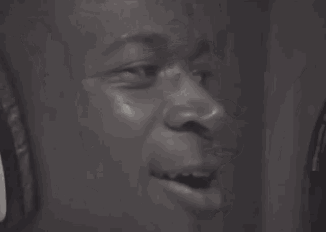 a close up of a person 's face with the words oh my god in white letters