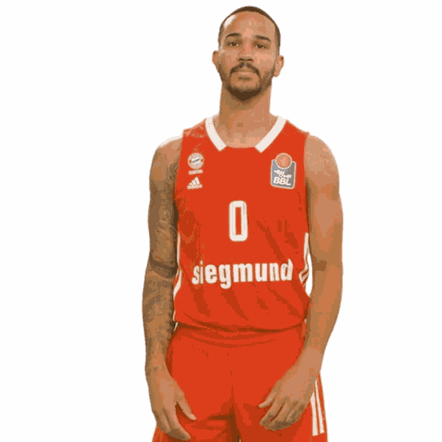 a basketball player wearing a red jersey that says siegmund