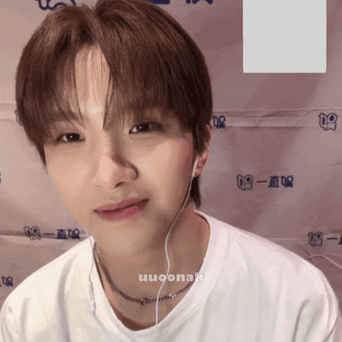 a close up of a person 's face with a watermark that says uuoona