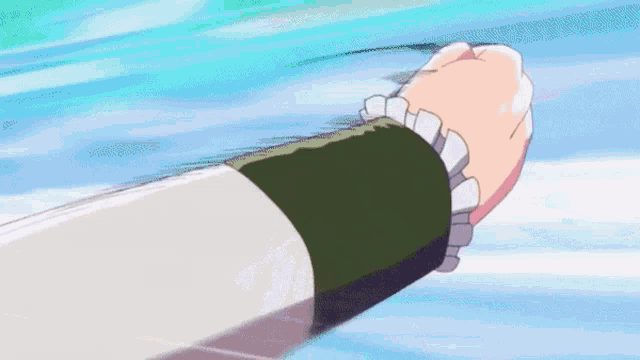 a person 's fist is being thrown in the air .