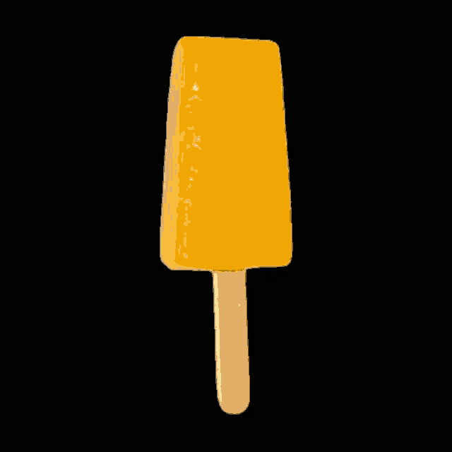 a scoop of yellow passion fruit ice cream next to a sliced passion fruit