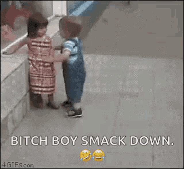 a boy and a girl are standing next to each other .
