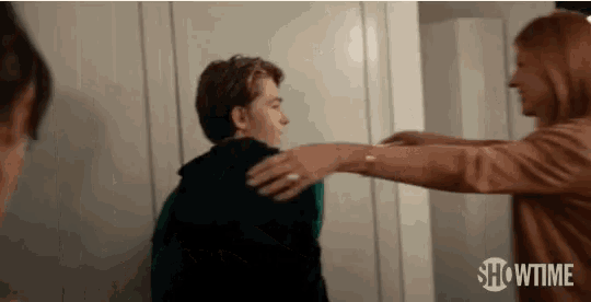 a showtime ad shows a woman hugging a boy