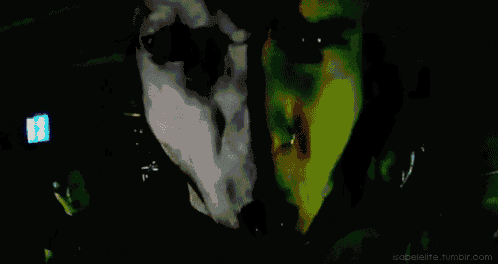 a close up of a person 's face with a blurred background that says ' i believe ' on the top right