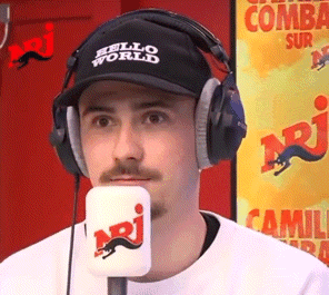 a man wearing headphones and a hat that says " hello world "