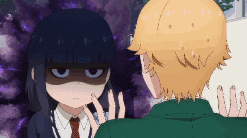 a man and a girl are looking at each other and the girl is making a funny face