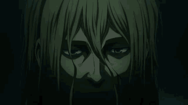a close up of a person 's face with a shadow on it