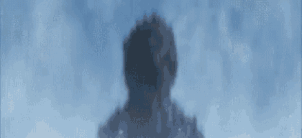 a close up of a person 's hair against a blue sky .