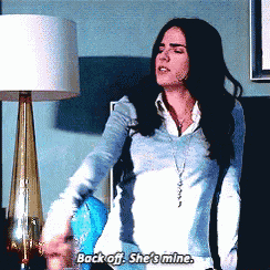 a woman says back off she 's mine in a room