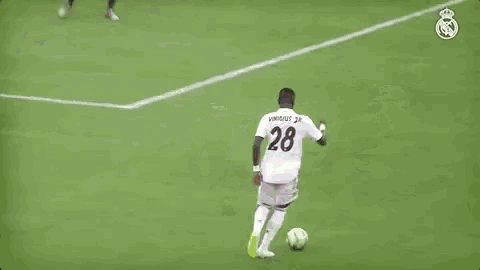 a group of soccer players are playing a game on a field .