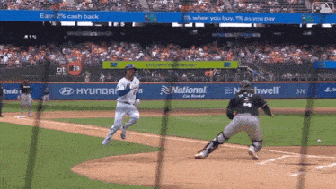 a baseball game is being played in a stadium sponsored by citi