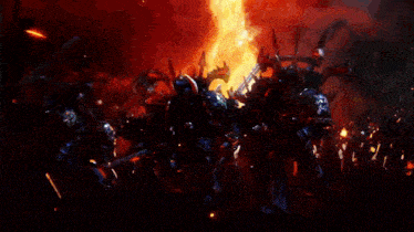a crowd of people are gathered in front of a large fire
