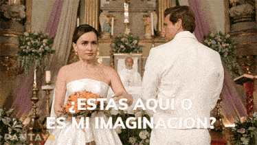 a bride and groom are standing in front of a church with the words " estas aqui o es mi imaginacion " written in white