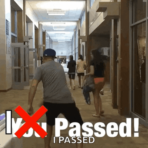 a man in a hallway with the words i passed
