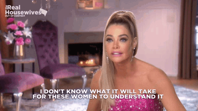 a woman in a pink dress says i don t know what it will take for these women to understand it