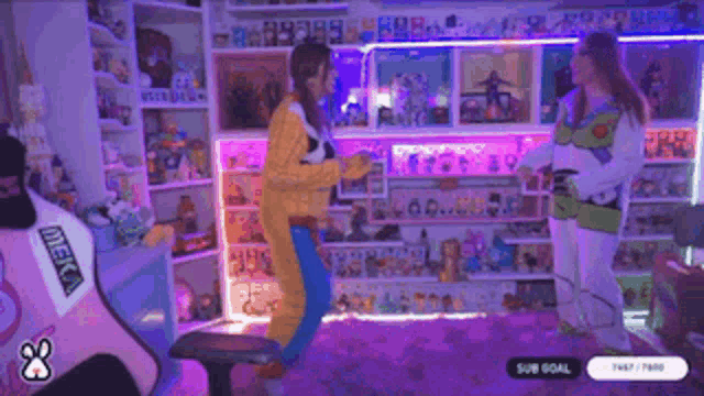 a woman in a buzz lightyear costume is standing next to another woman in a costume