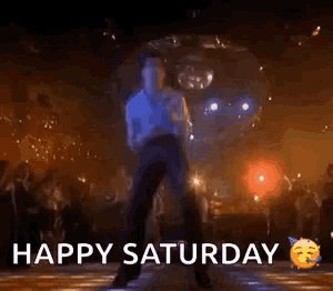 a man is dancing on a disco floor in front of a disco ball .