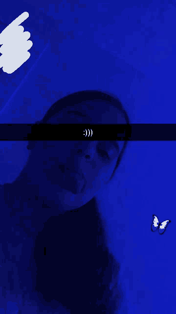 a woman 's face is shown with a smiley face and two butterflies