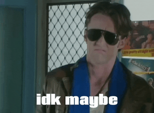 a man wearing sunglasses and a blue scarf has the words idk maybe written on his face
