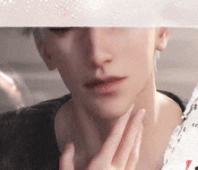 a close up of a person 's face with a white border