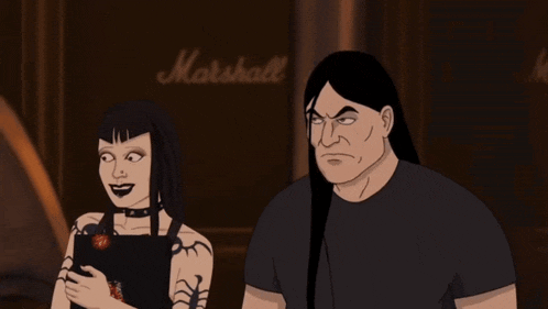 a man and woman are standing in front of a marshall sign