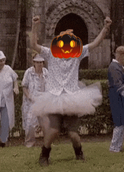 a man in a tutu with a pumpkin on his face
