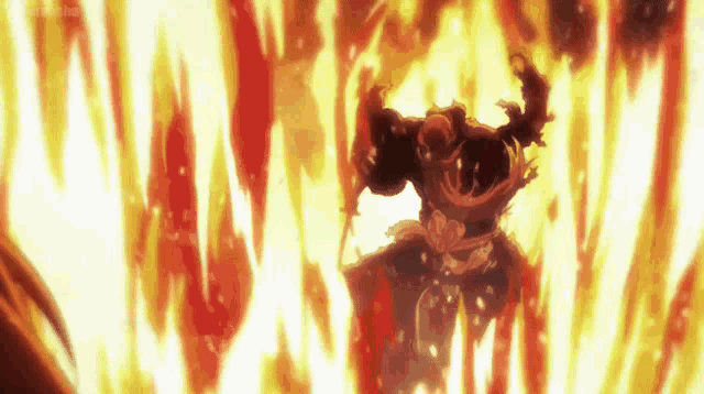 a man is standing in front of a wall of flames that says ' tokyo ghoul ' on it